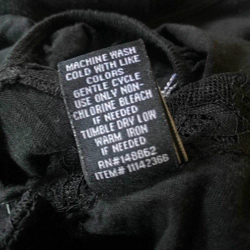 NWOT Disney’s Nightmare Before Christmas black lace hi-lo top - Picture 11 of 11